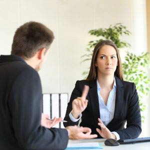 Businesswoman saying no to salesman