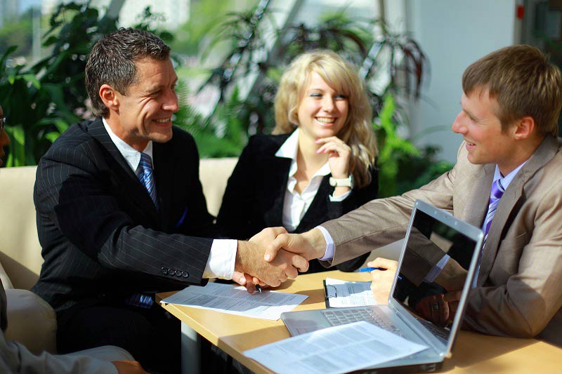 Business people shaking hands