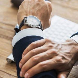 Business Man Check Time Delay