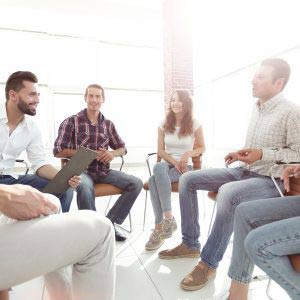 team sitting in a lesson