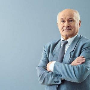 senior businessman cross hands