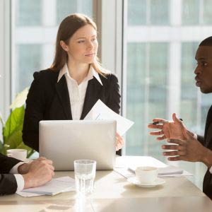 Management meeting taking place with employees