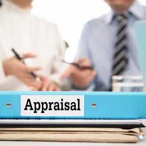 Blue appraisal folder with meeting in background