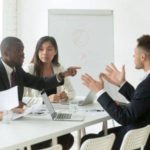 Employees arguing in a meeting