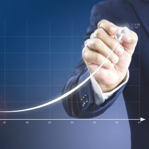 Businessman with increasing graph