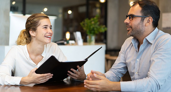 Two people collaborating on a project