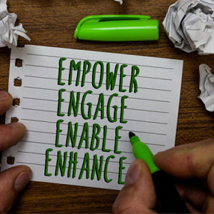 Word writing text Empower Engage Enable Enhance. Business concept