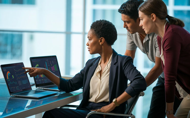 A laptop showing training management software